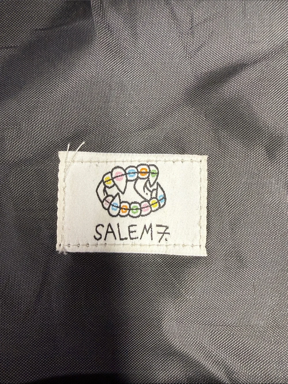 Salem 7 Black Sherpa Backpack with Salem Embroidered Design